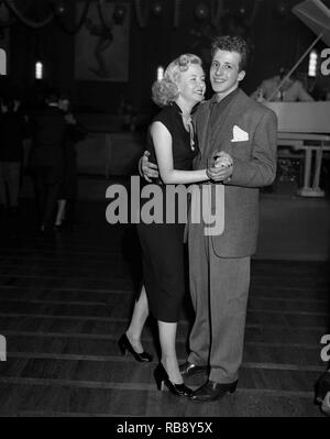Dancing in the 1950s. A young couple is dancing and moving to the music. Sweden Ref 34K-33 Stock Photo