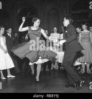 Dancing in the 1950s. A young couple is dancing and moving to the music. Sweden Photo Kristoffersson.  Ref CC22-8 Stock Photo