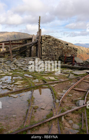 Derelict mine workings at Saddlestone Quarry on the flank of The Old Man of Coniston in the Lake District National Park, Cumbria, England. Stock Photo