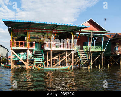 Stilted homes in Kampong Phluk floating village on Kamoong Phluk River Siem Reap Cambodia Asia home to approximately 3000 predominately Khmer fishing  Stock Photo