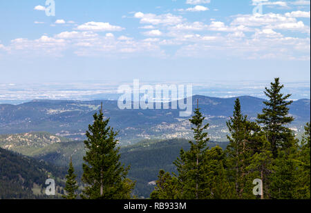 View of downtown Denver, Colorado city skyline seen from the front range mountains Stock Photo