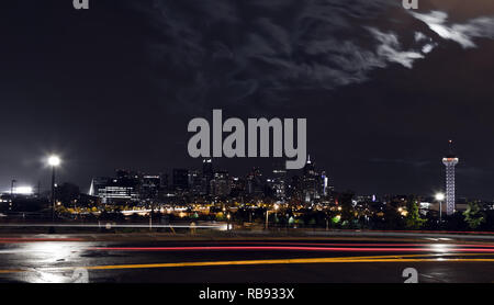 Dark night view of the downtown Denver Colorado skyline with colorful night lights Stock Photo