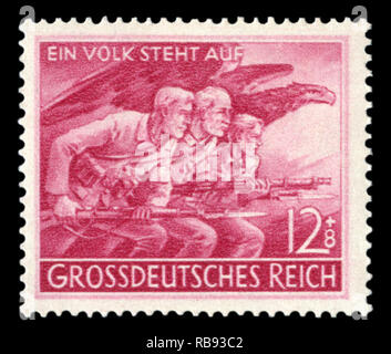 German historical stamp: Creating Folksturm folk squads. Members of the national militia on the background of the imperial eagle. 1945, Germany Stock Photo