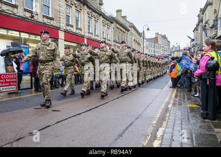 Soldiers from the British Army 9 Theatre Logistic Regiment of the Royal Logistic Corps are shown marching through Chippenham to mark Commonwealth Day Stock Photo