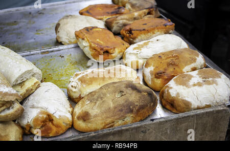 Stuffed sausage sandwich in restaurant, fast and insane food Stock Photo