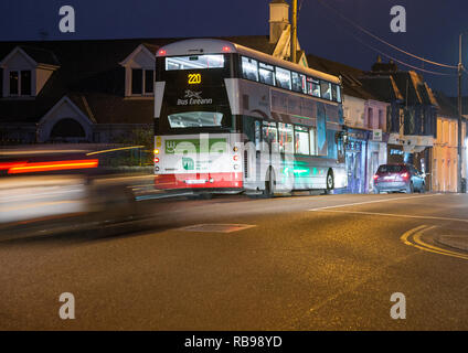 Carrigaline, Cork, Ireland. 08th January, 2019. An early morning bus picking up passengers on the bridge in Carrigaline, Co. Cork. From midnight on the 13th January the Ballincollig to Carrigaline bus service is to become a 24-hour service and will operate on a 30 min/60 minute frequency. Credit: David Creedon/Alamy Live News Stock Photo