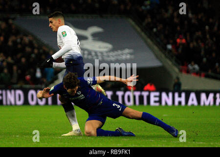 London, UK. 8th January, 2019. Erik Lamela of Tottenham Hotspur (L) concedes a foul by tackling Marcus Alonso of Chelsea (R). Carabao Cup semi final, 1st leg match, Tottenham Hotspur v Chelsea at Wembley Stadium in London on Tuesday 8th January 2019 .  this image may only be used for Editorial purposes. Editorial use only, license required for commercial use. No use in betting, games or a single club/league/player publications . pic by Steffan Bowen/Andrew Orchard sports photography/Alamy Live news Stock Photo