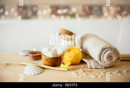 Using natural material products in home, different eco friendly cosmetic products in bathroom. Minimizing ecological footprint concept. Bamboo bath to Stock Photo