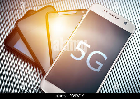 Smartphones, 5G mobile communications standard Stock Photo