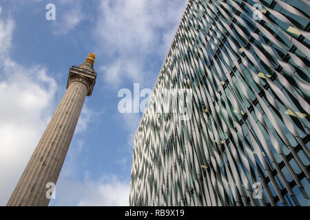 The Monument to the Great Fire of London, more commonly known simply as the Monument, is a Doric column in London. Stock Photo