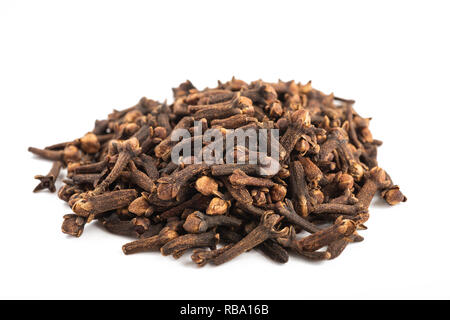 Cloves heap isolated on white background Stock Photo