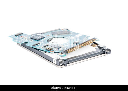 broken hard drive with chip board on top, isolated on white background Stock Photo