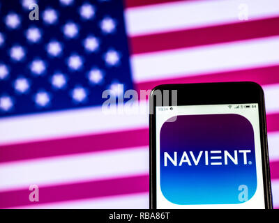 Navient Corporation logo seen displayed on smart phone Stock Photo