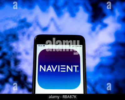 Navient Corporation logo seen displayed on smart phone Stock Photo