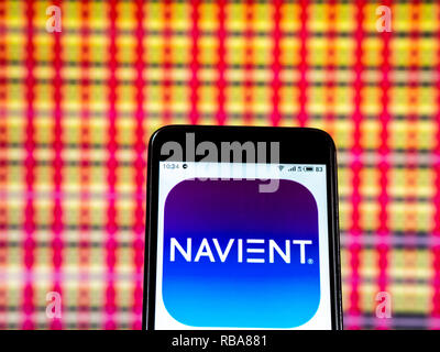 Navient Corporation logo seen displayed on smart phone Stock Photo