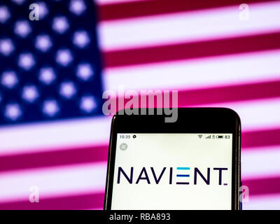 Navient Corporation logo seen displayed on smart phone Stock Photo