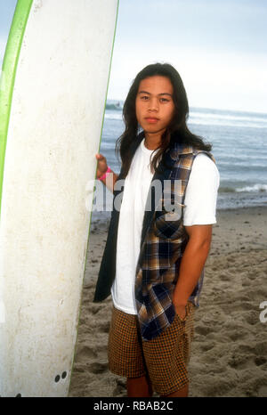 MALIBU, CA - JULY 25: Actor Ernie Reyes Jr. attends 3rd Annual Celebrity Surfing Competition event on July 25, 1993 at Malibu Surfrider Beach in Malibu, California. Photo by Barry King/Alamy Stock Photo Stock Photo