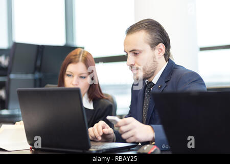 Business people in modern office. Stock Photo