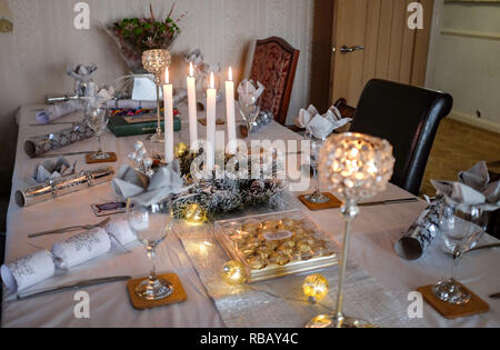 Table set for festive meal at Christmas Stock Photo
