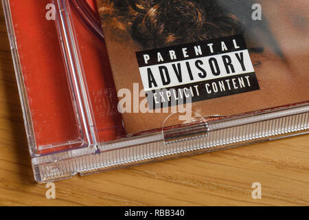 A Parental Advisory label on a compact disc case Stock Photo