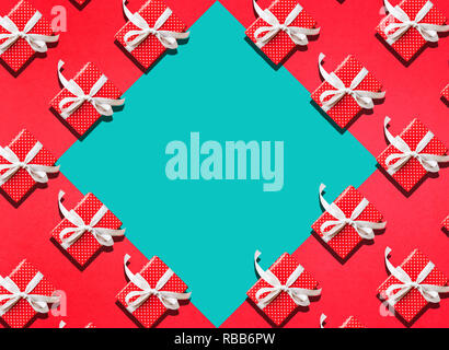 Celebration anniversary backgrounds concepts ideas with gift box present in red dot pattern color.Flat lay design template Stock Photo