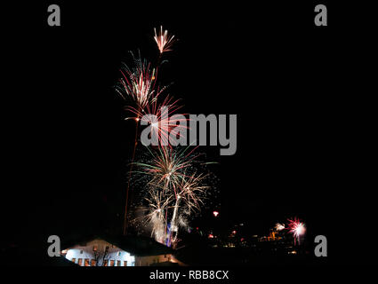 Colourful Fireworks in black sky on mountain baita Stock Photo