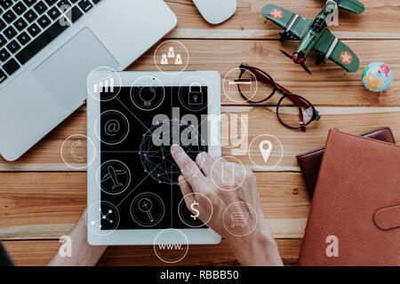 Man Hands using digital tablet with Virtual Diagram Icon.Top view,Flat lay. Stock Photo