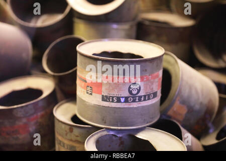 An exhibition at Auschvitz 1 concentration camp, here showing Zyklon B canisters, a pesticide, used for killing victims in gas chambers, Poland Stock Photo