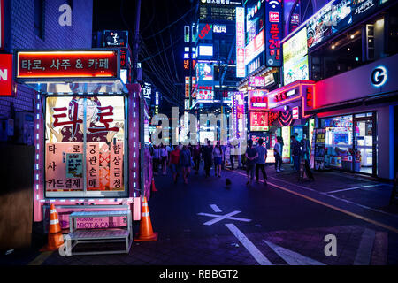 Seoul, South Korea - September 8 2017: Gangnam shopping street with colorful neon lights at night Stock Photo