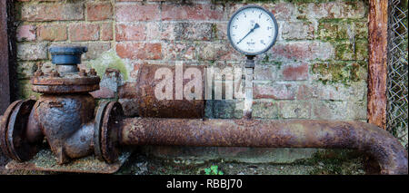 manometer with rusty pipes Stock Photo