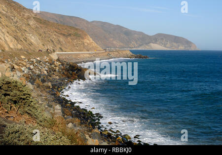 The rugged Pacific Ocean coastline along the Pacific Coast Highway is pictured at Point Mugu, California, located between Oxnard and Malibu. Stock Photo