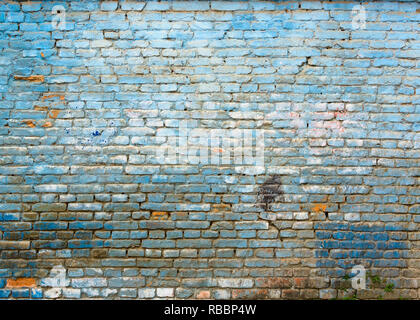 Old grungy blue brick wall texture Stock Photo