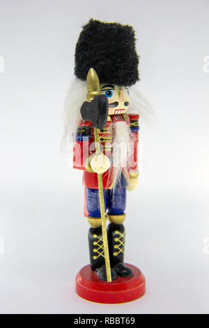 Vintage Christmas Decor Wooden Nutcracker on White Background Isolated. Stock Photo
