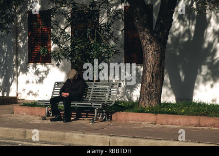 typical Sardinia senior man taking in a small village - siesta in italy Stock Photo