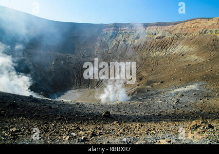 Smoke and steam coming out from the crater of the volcano in Vulcano island, Aeolian Islands Archipelago, Sicily, Italy Stock Photo