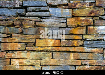 Old rustic stone wall - high quality texture / background Stock Photo