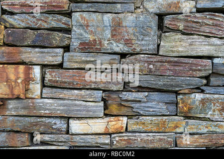 Old rustic stone wall - high quality texture / background Stock Photo