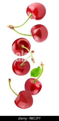 Flying fresh cherry berries isolated on white  Stock Photo