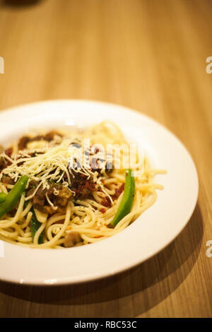 Beef steak aglio olio pasta Stock Photo