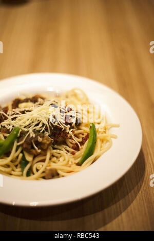 Beef steak aglio olio pasta Stock Photo