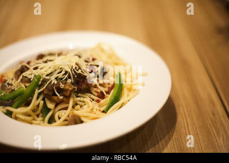 Beef steak aglio olio pasta Stock Photo
