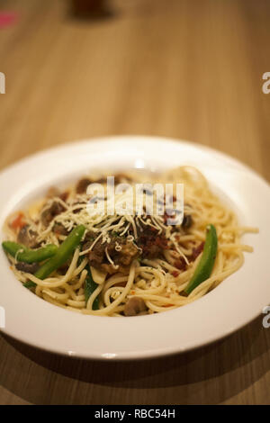 Beef steak aglio olio pasta Stock Photo