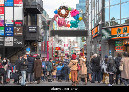 Harajuku street view. People, mostly youngsters, walk through Takeshita Street, a famous shopping street lined with fashion boutiques, cafes and resta Stock Photo