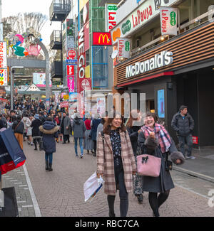 Harajuku street view. People, mostly youngsters, walk through Takeshita Street, a famous shopping street lined with fashion boutiques, cafes and resta Stock Photo