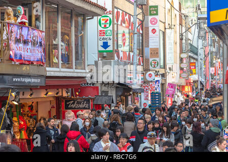 Harajuku street view. People, mostly youngsters, walk through Takeshita Street, a famous shopping street lined with fashion boutiques, cafes and resta Stock Photo