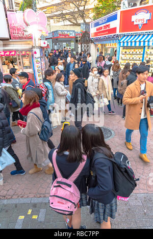 Harajuku street view. People, mostly youngsters, walk through Takeshita Street, a famous shopping street lined with fashion boutiques, cafes and resta Stock Photo