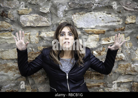 Abused woman scared, gender violence, fear Stock Photo