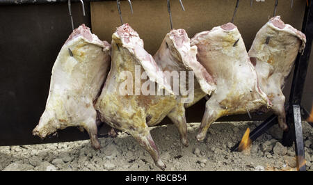 Pig roasted in embers, celebration and traditional food Stock Photo