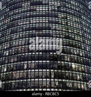 Windows of the office building at night background Stock Photo