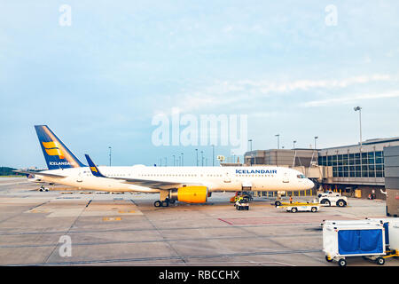 Dulles, USA - June 13, 2018: Dulles Internation Airport, IAD, with Icelandair airplanes during sunset with view of terminal in Virginia, large plane Stock Photo